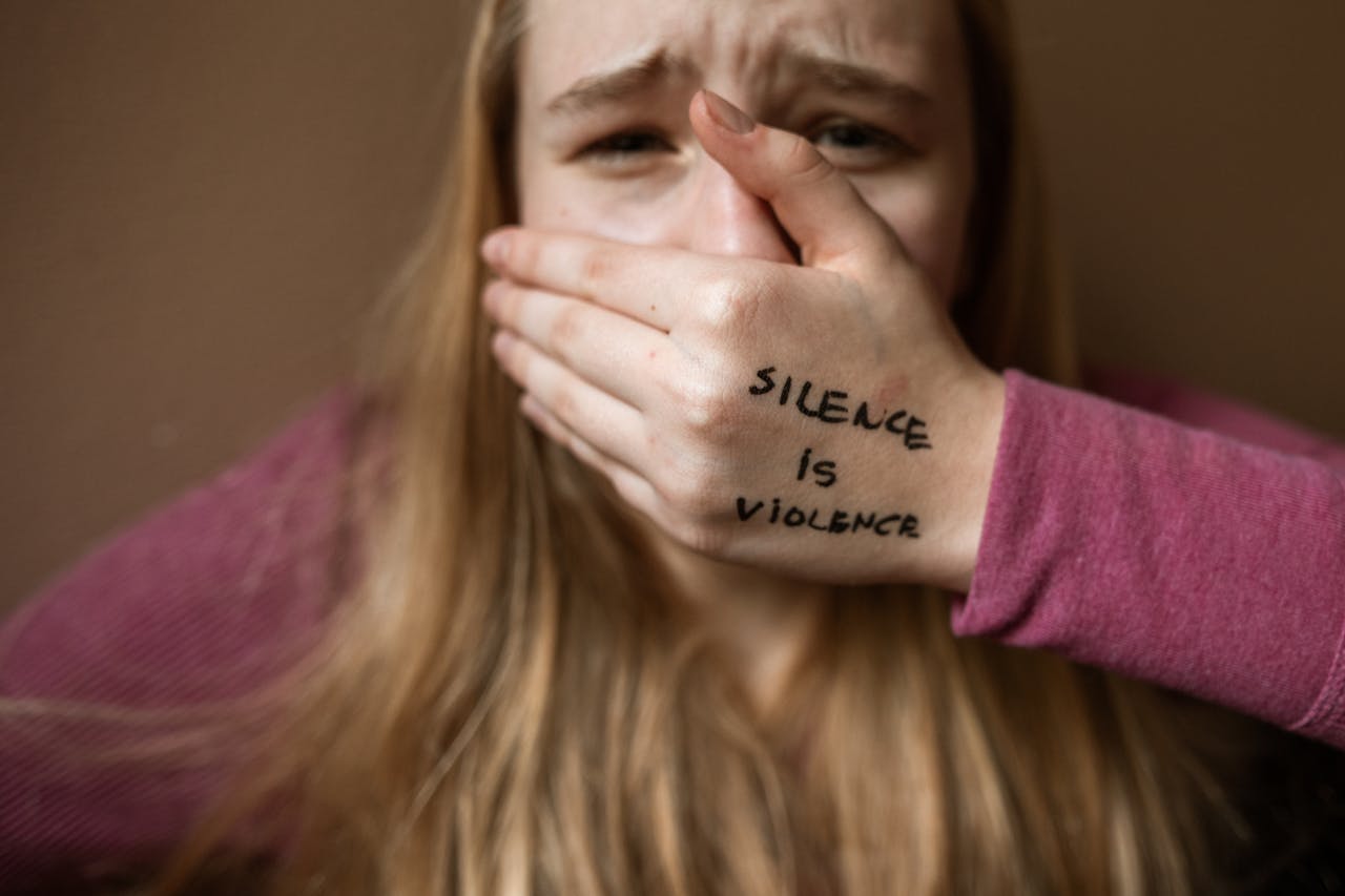 heros-img Powerful image highlighting the message 'Silence is Violence' to raise awareness on social issues.