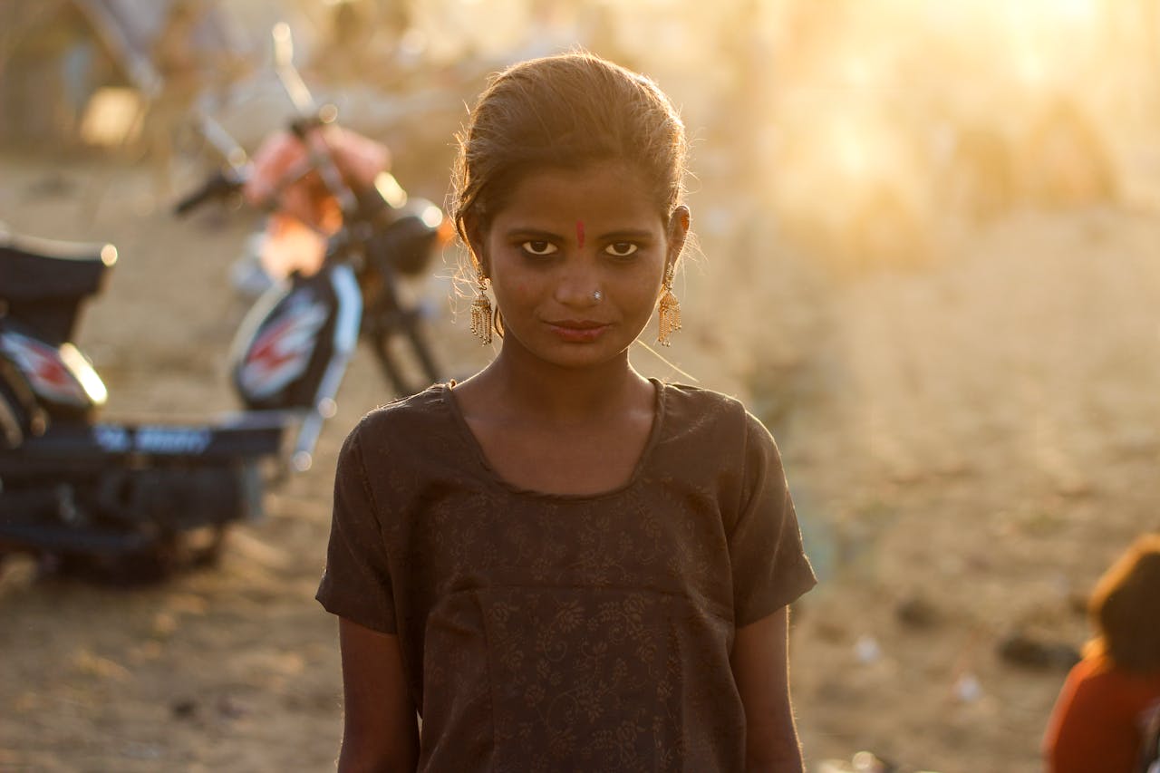 services-03 Portrait of a young girl in Pushkar, India, captured at sunset with warm tones.